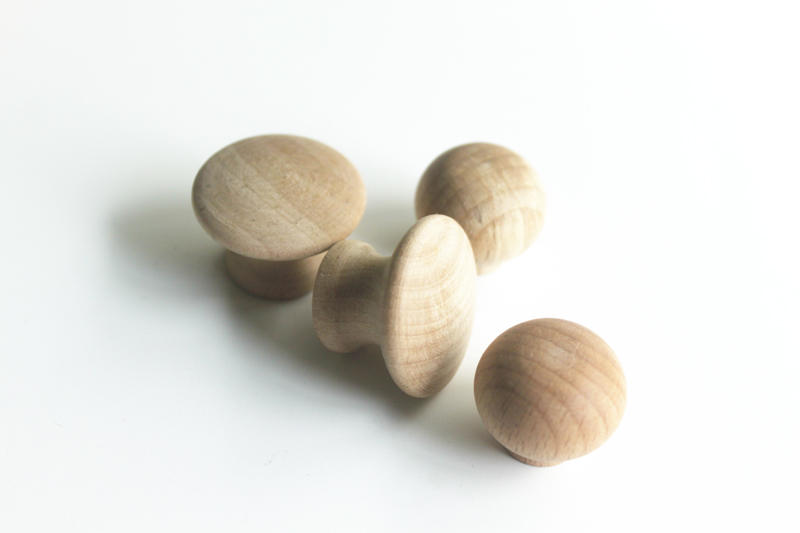 small round wooden knobs